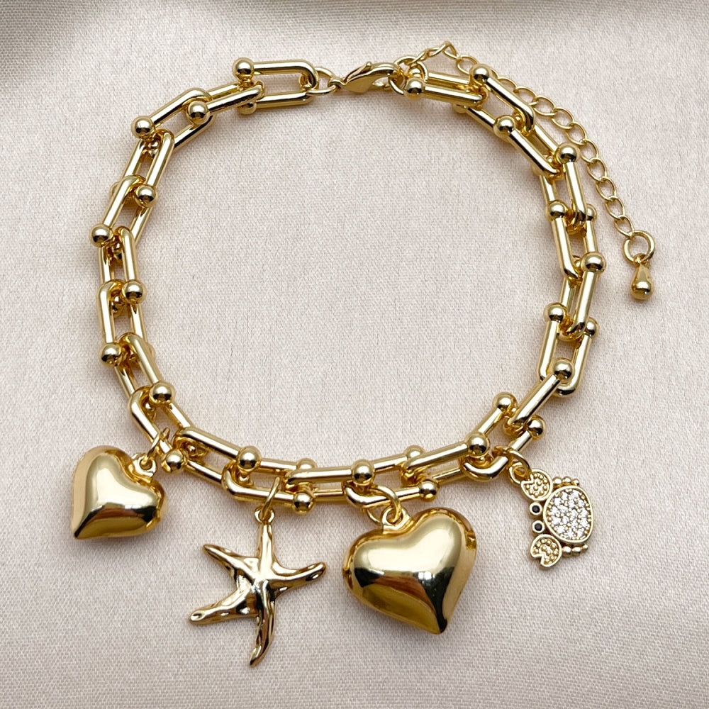 Oro Laminado Charm Bracelet, Gold Filled Style Heart and Star Design, with White Micro Pave and Black Cubic Zirconia, Polished, Golden Finish